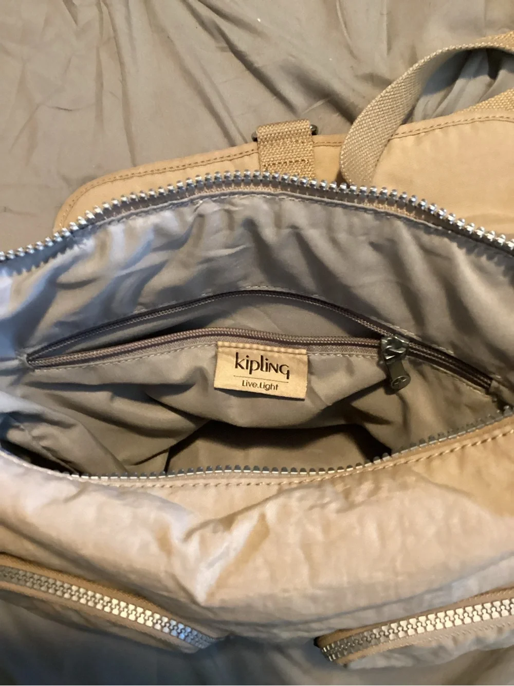 the Kipling tan Rita Messenger crossbody bag